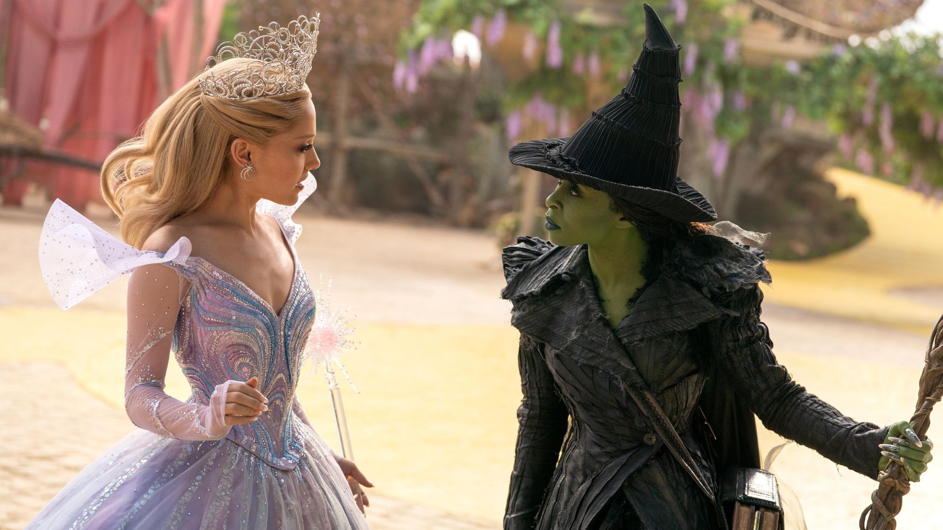 Glinda and Elphaba look at each other