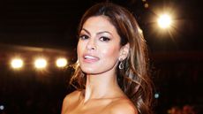 eva mendes on a black background