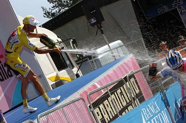 Piepoli douses his Lampre friend with some cold champagne