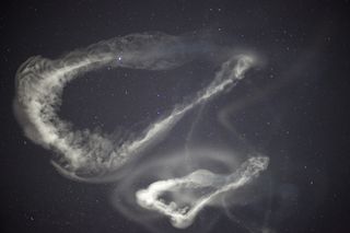 Chemical tracer clouds released by atmospheric NASA rockets.