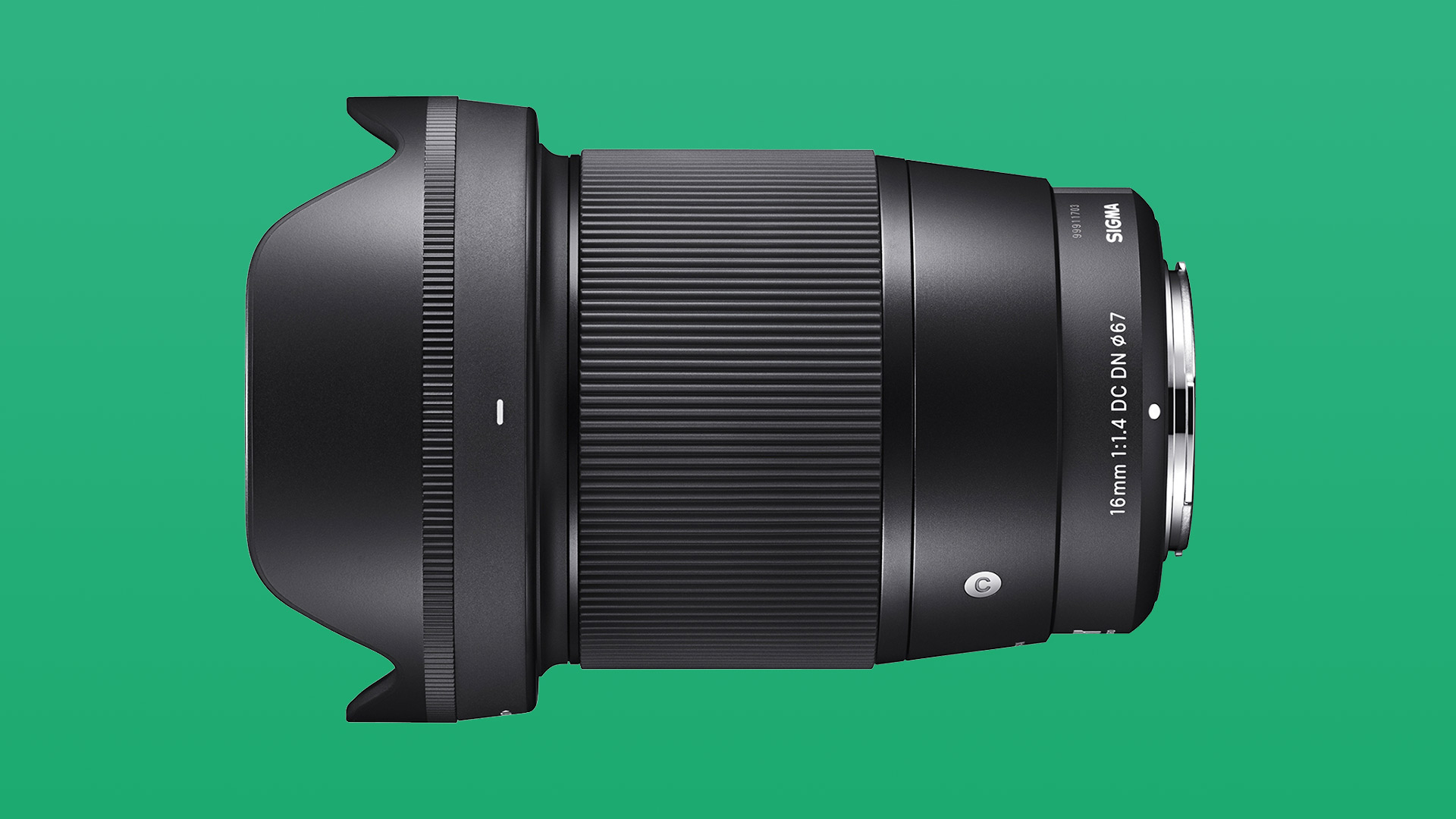 Sigma 16mm f/1.4 DC DN Contemporary Lens on a green background