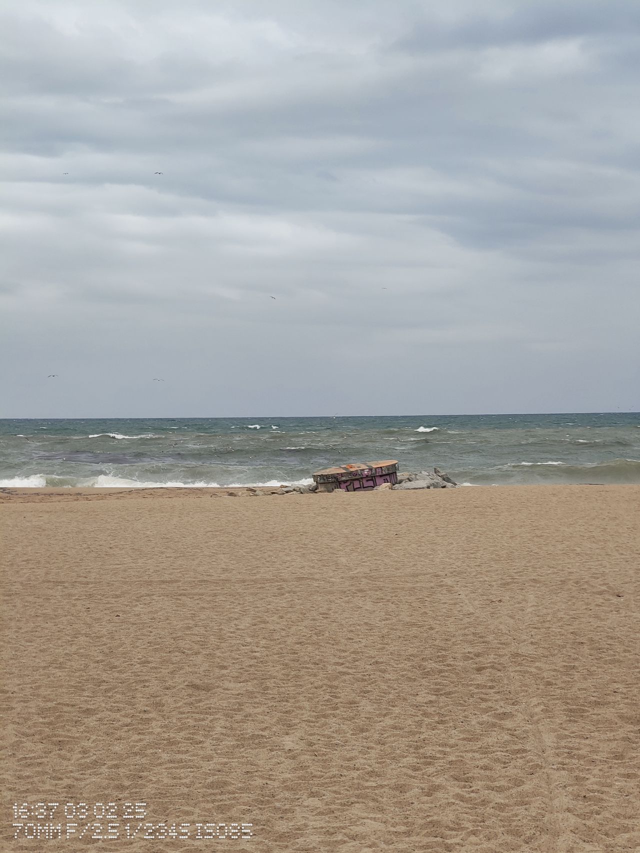 A windswept beach in Barcelona