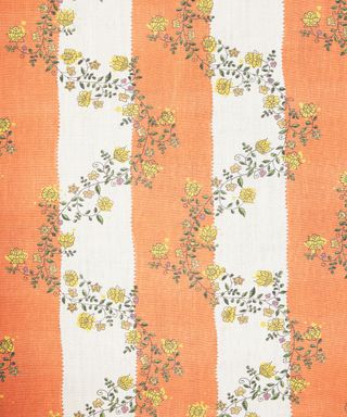 colourful fabric striped orange and white with yellow flowers