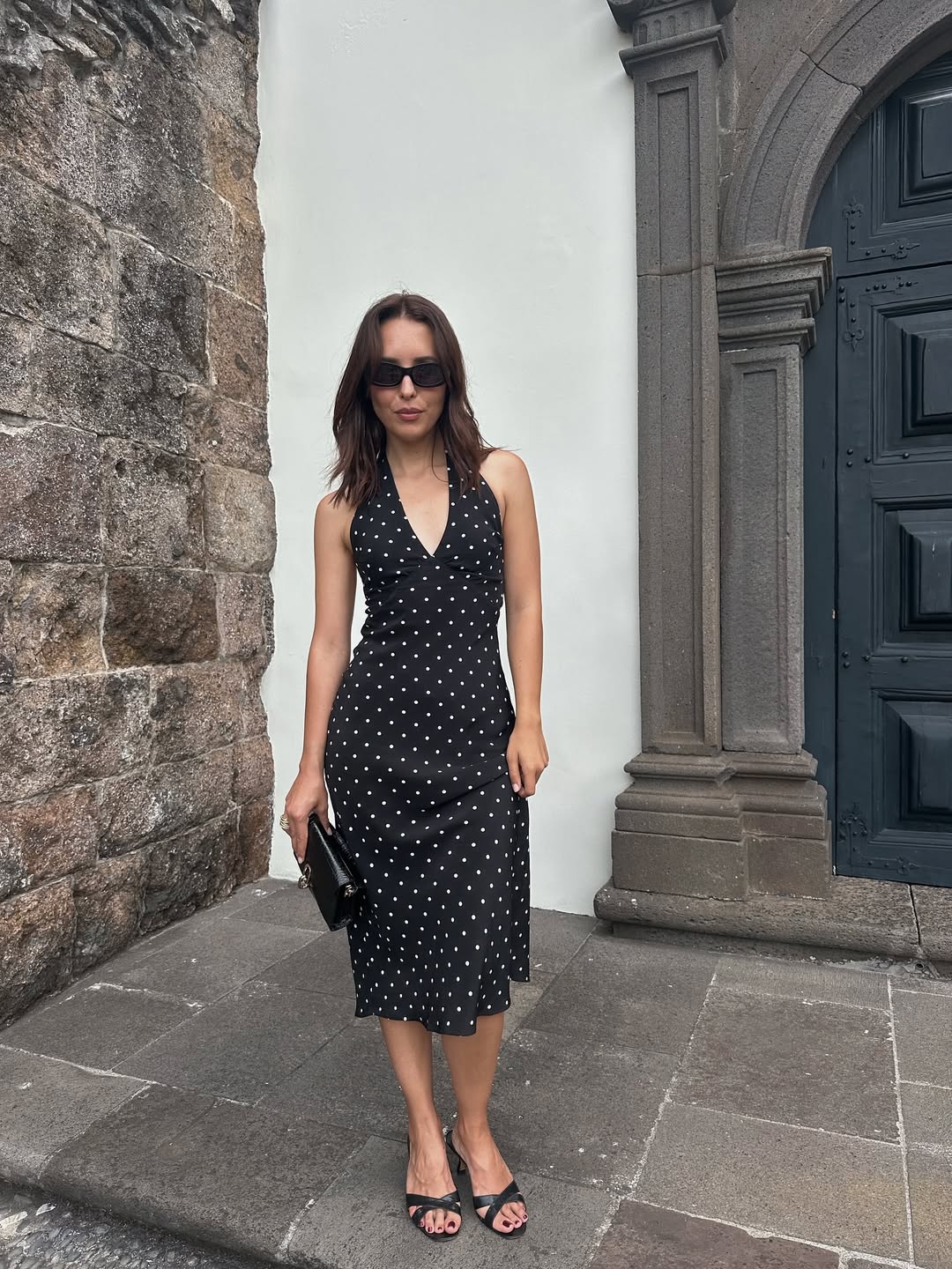 Debora Rosa wearing a pair of Manolo Blahnik Callamu Mules.