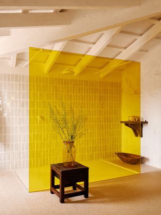 Bathroom with yellow glass shower screen