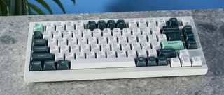 The Keychron Q1 HE magnetic keyboard in white and green