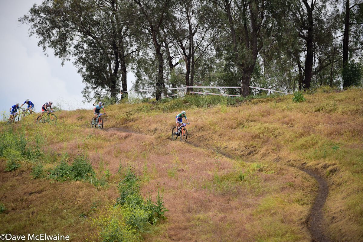 Eva Lechner (Luna Pro Team) leads Emily Batty and three others at the top of the course