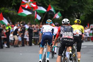 BILBAO, SPAIN - SEPTEMBER 03: Louis Rouland of France and Team Arkea - B&B Hotels while pro-Palestinian protest after the La Vuelta - 80th Tour of Spain 2025, Stage 11 a 157.4km stage from Bilbao to Bilbao / Due to incidents at the finish line, the official times for the GC were taken at 3km from the finish line, there was no stage winner / #UCIWT / on September 03, 2025 in Bilbao, Spain. (Photo by Tim de Waele/Getty Images)