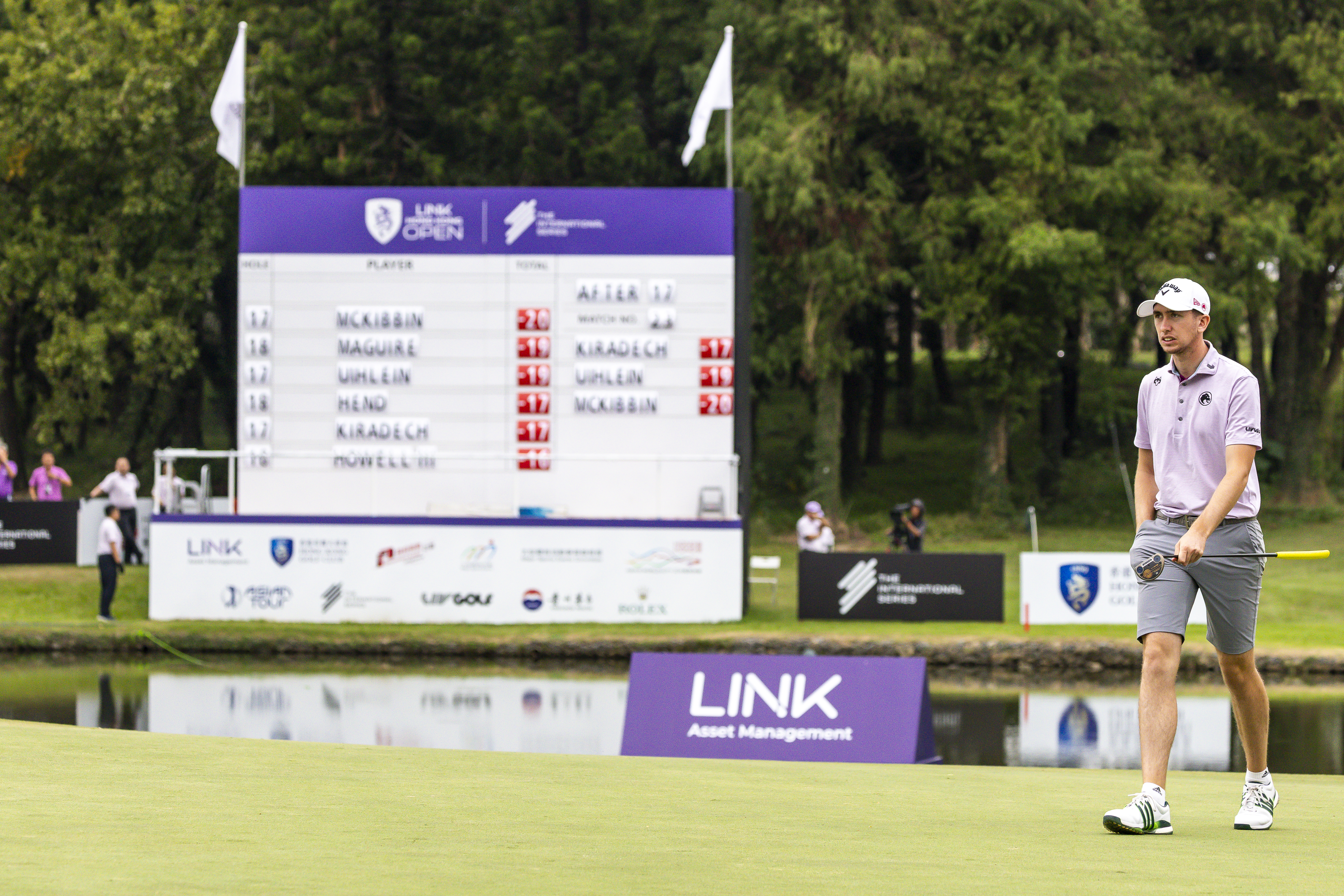 Tom McKibbin walks on the green at the Hong Kong Open