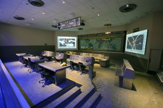 NASA's authentic Mercury Control Center consoles and equipment on display inside the Heroes & Legends attraction at the Kennedy Space Center Visitor Complex in Florida.