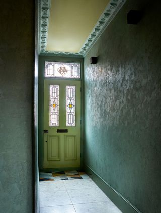 a hallway with venetian style limewash paint