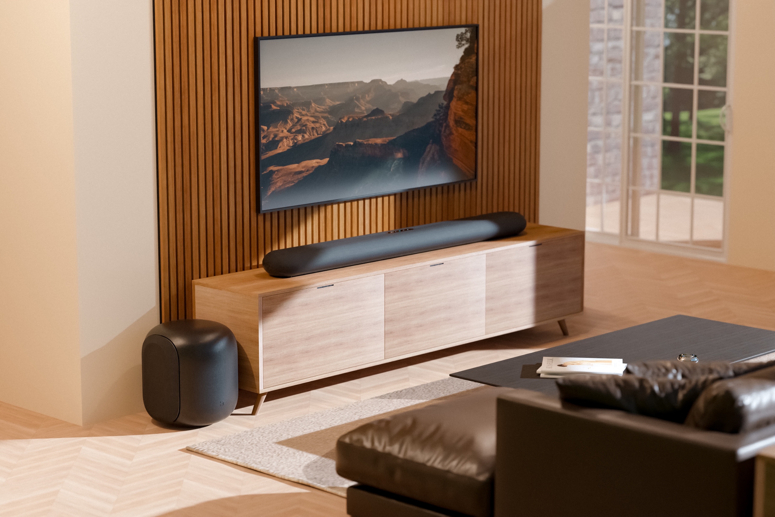 Promotional images showing Bluesound's Pulse home cinema in action