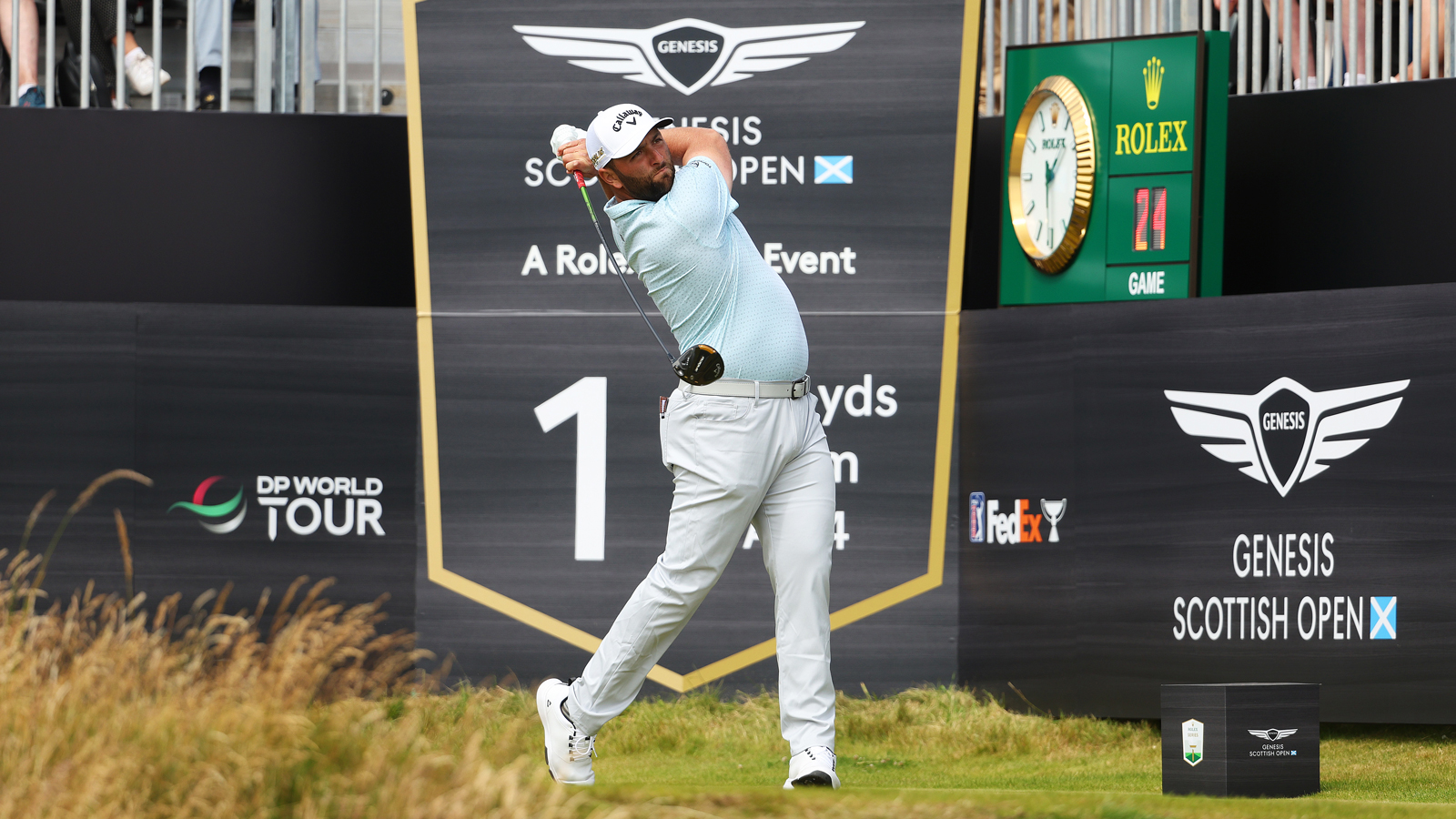 Jon Rahm hits a tee shot