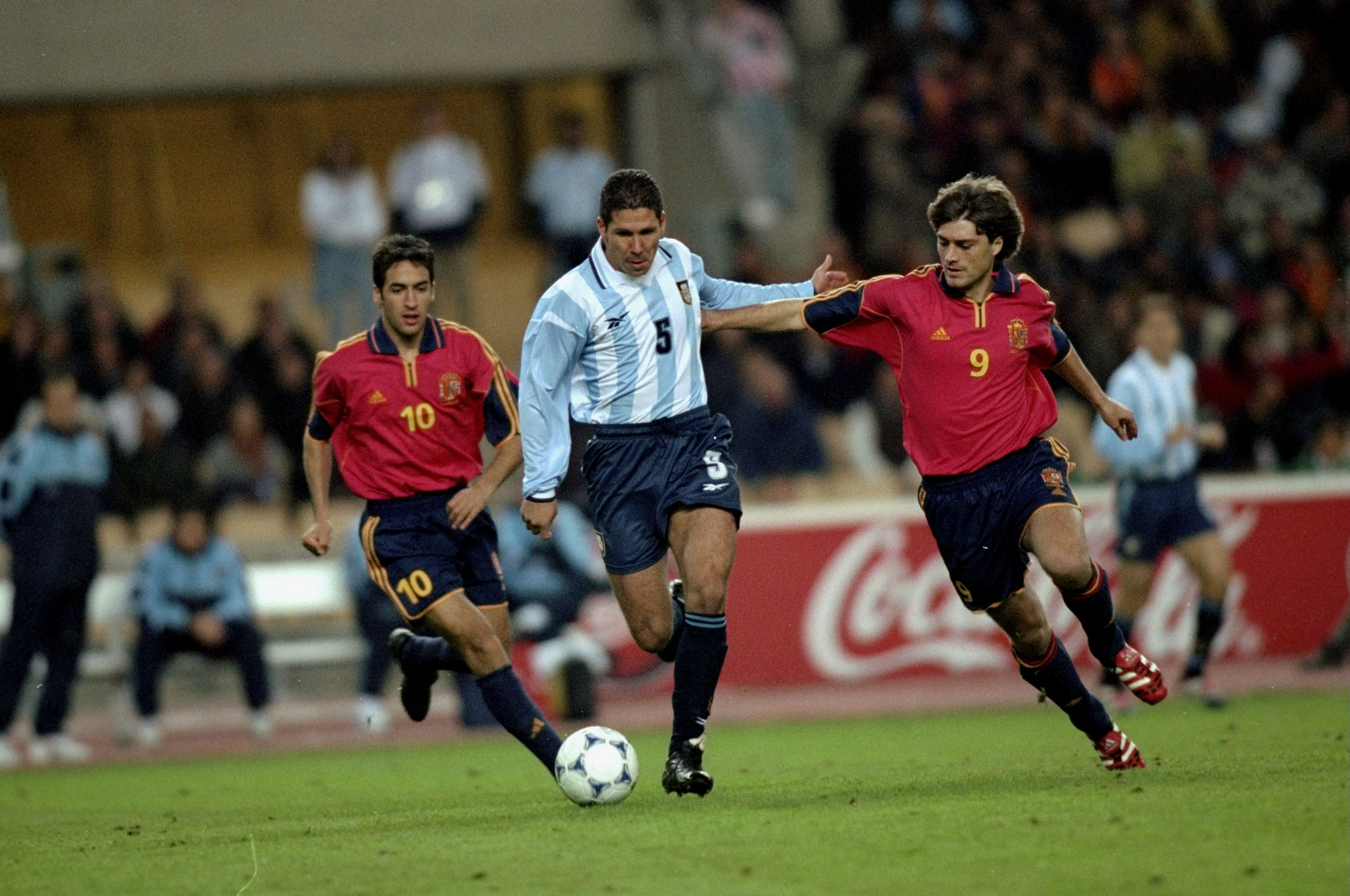 Julen Guerrero (right) competes for the ball with Diego Simeone in a friendly between Spain and Argentina in November 1999.