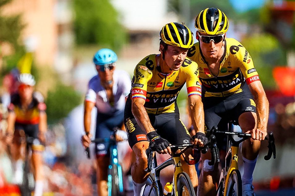 Primoz Roglic in pain as he finishes stage 16 of the Vuelta a Espana after a crash