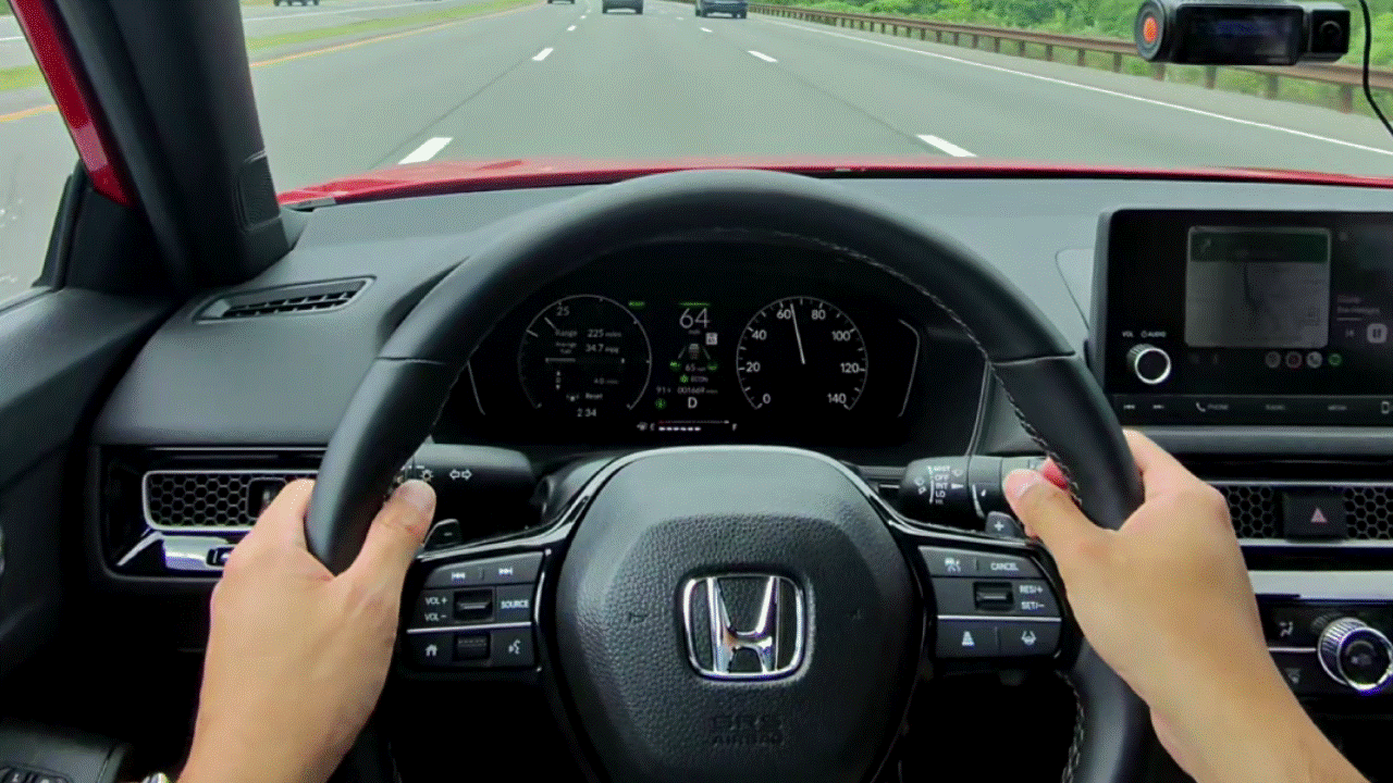 2025 Honda Civic Sport Hatchback Hybrid adaptive cruise control.