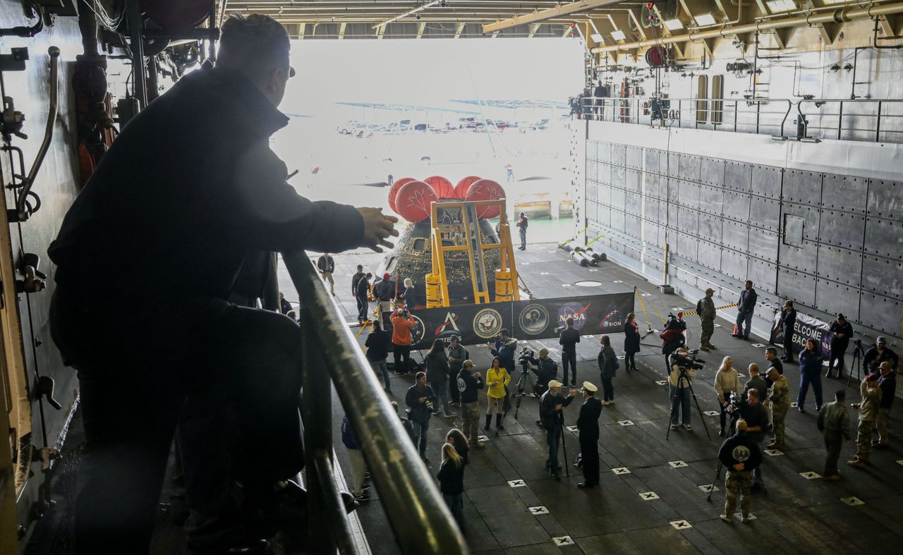 Pictures of the Orion spacecraft being treated after arriving in port in San Diego on Dec. 13, 2022.