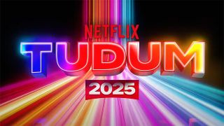 The logo for Netflix Tudum 2025 in bright colors sitting on a black and colorful background