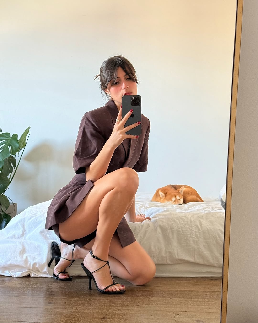 @tamaramory wearing a short-sleeved linen top