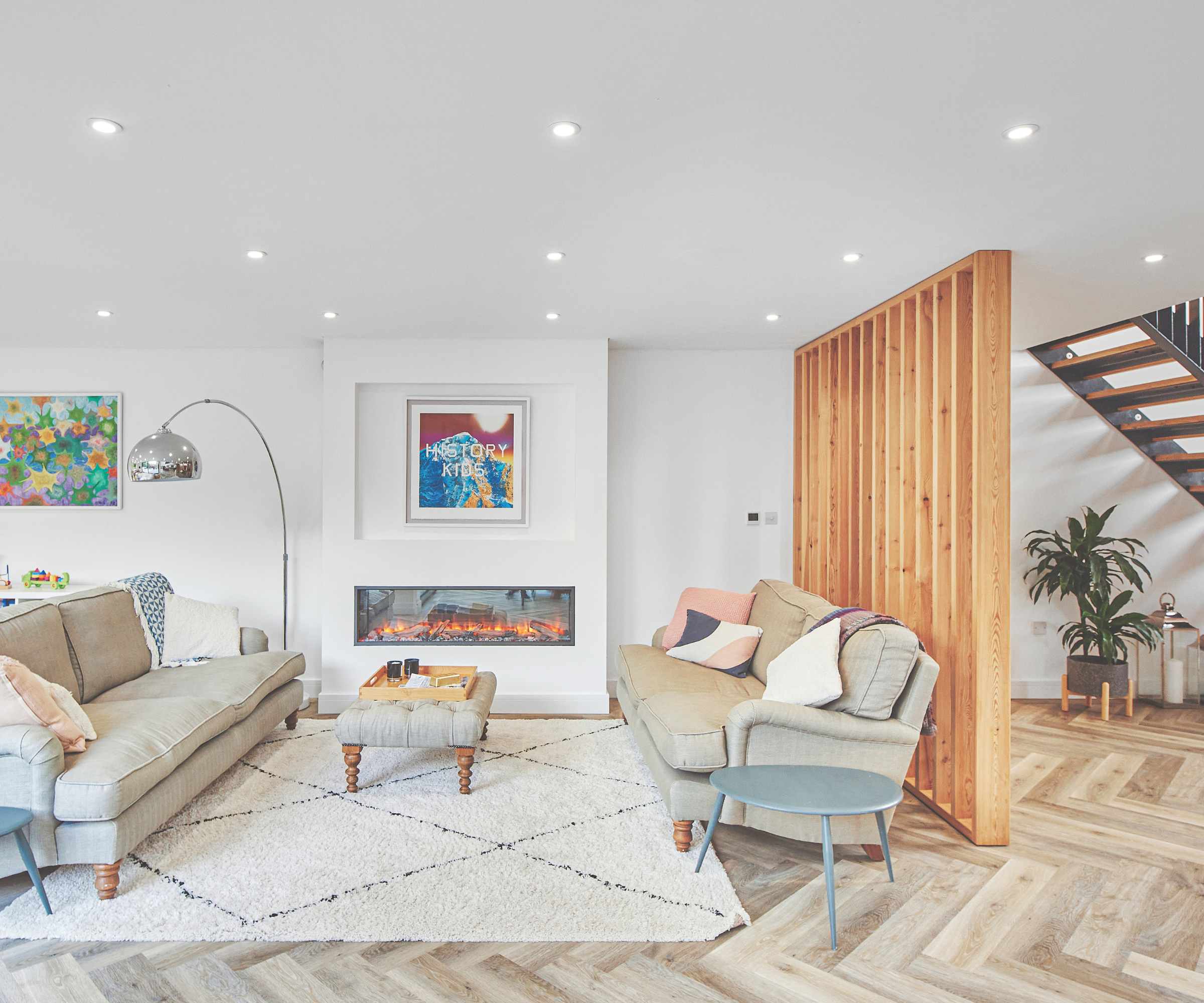 living room with herringbone flooring