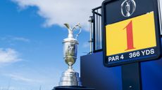 The Claret Jug and a 1st tee sign at The Open