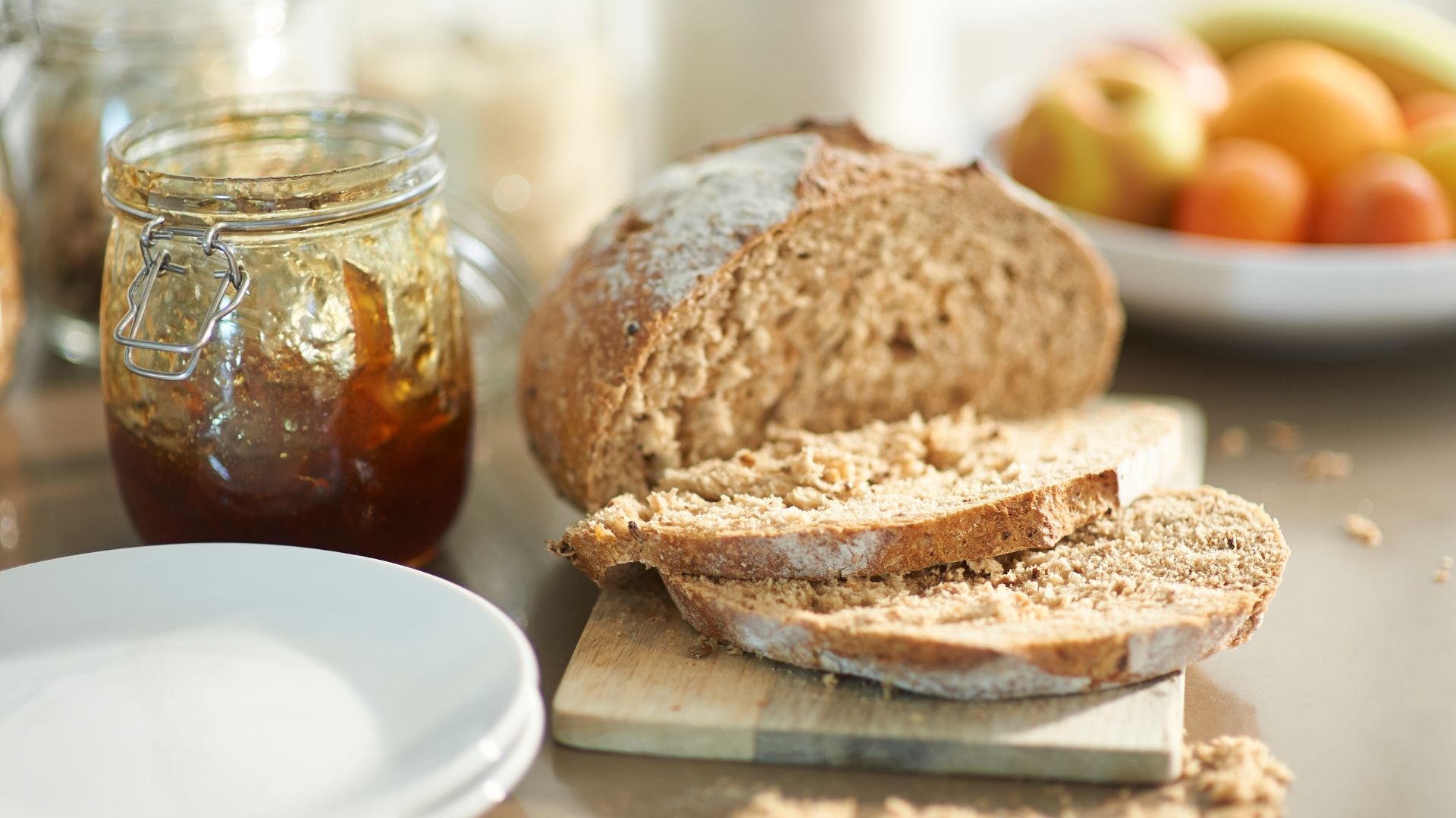 Foods you can eat past their expiry date - Bread on a chopping board