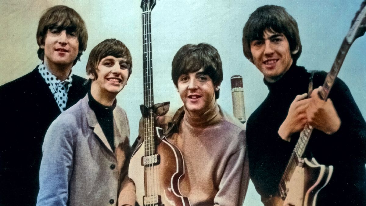 The Beatles pose for a portrait in the studio in circa 1965. 