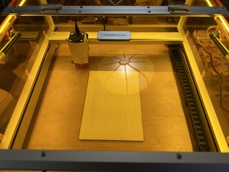 A TOOCAA L2 laser cutter and engraver in use
