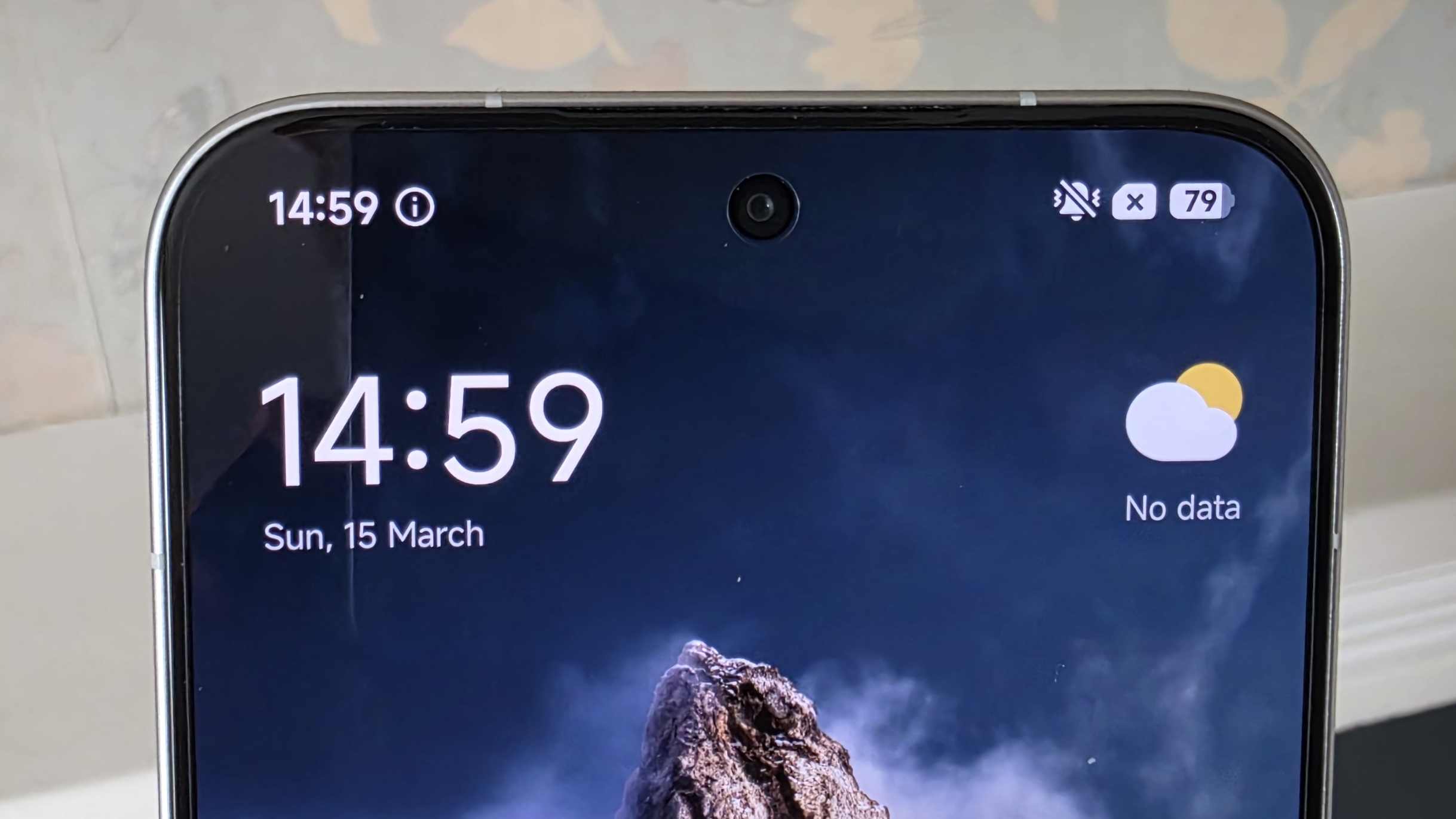 The top of the Poco X8 Pro Max screen, showing its punch-hole camera.