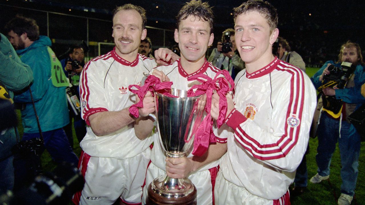 Mike Phelan, Bryan Robson and Lee Sharpe with the Cup Winners Cup in 1991