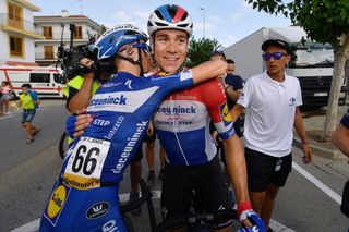 Fabio Jakobsen is congratulated by his teammates