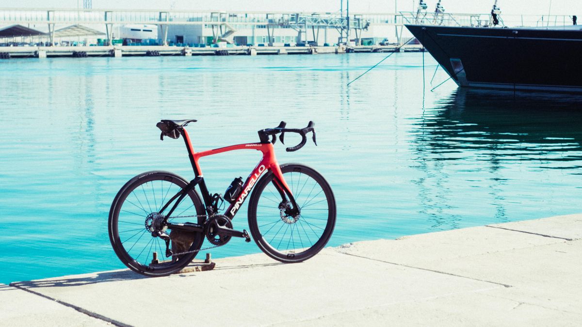 A red and black pinarello F road bike