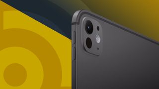 Apple iPad Pro back corner showing camera bump on a golden TechRadar logo background