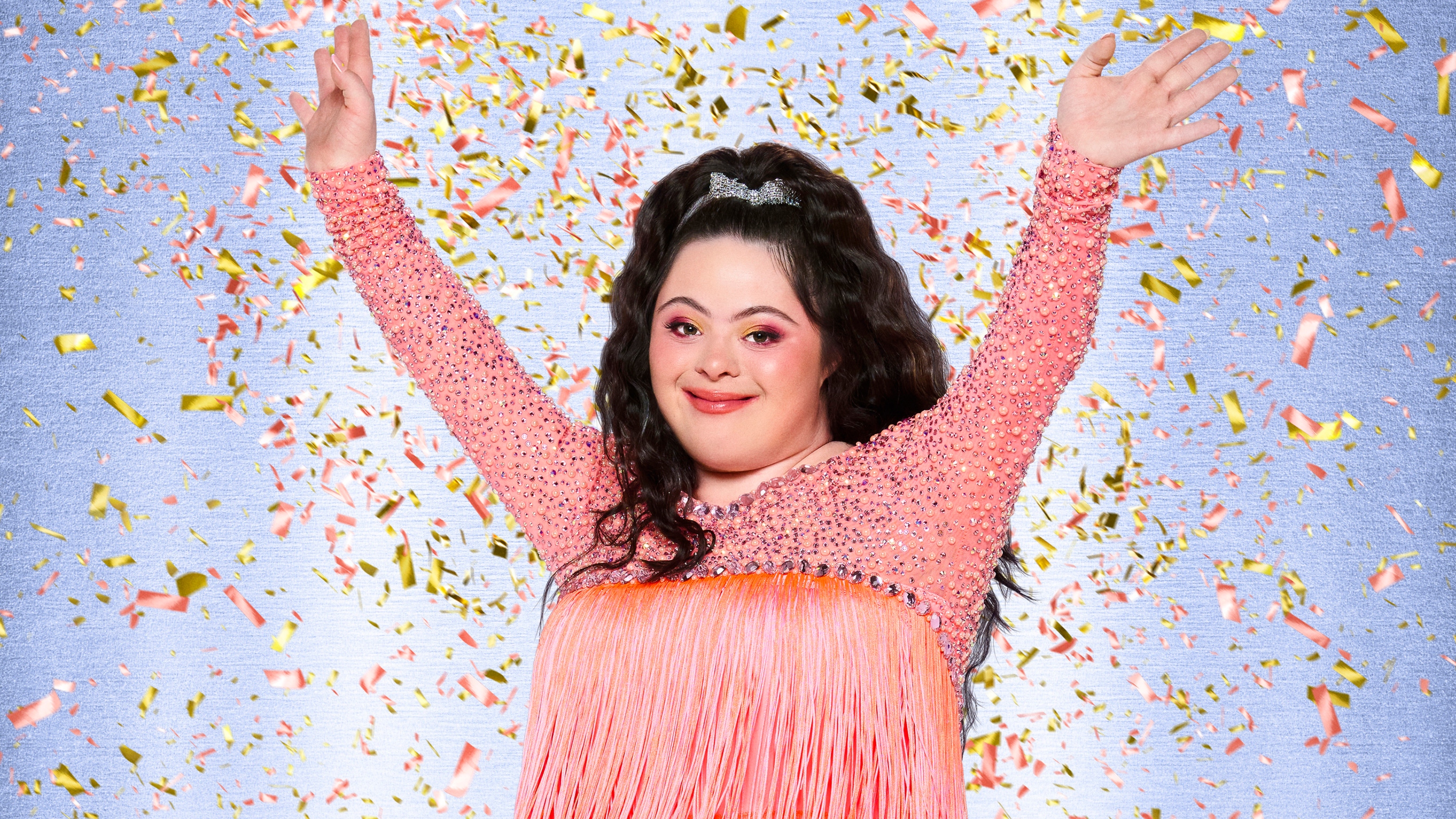 Strictly Come Dancing 2025 - Ellie Goldstein in a pink sequinned dress with confetti falling around her.