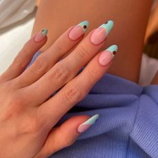 Turquoise French tip nails