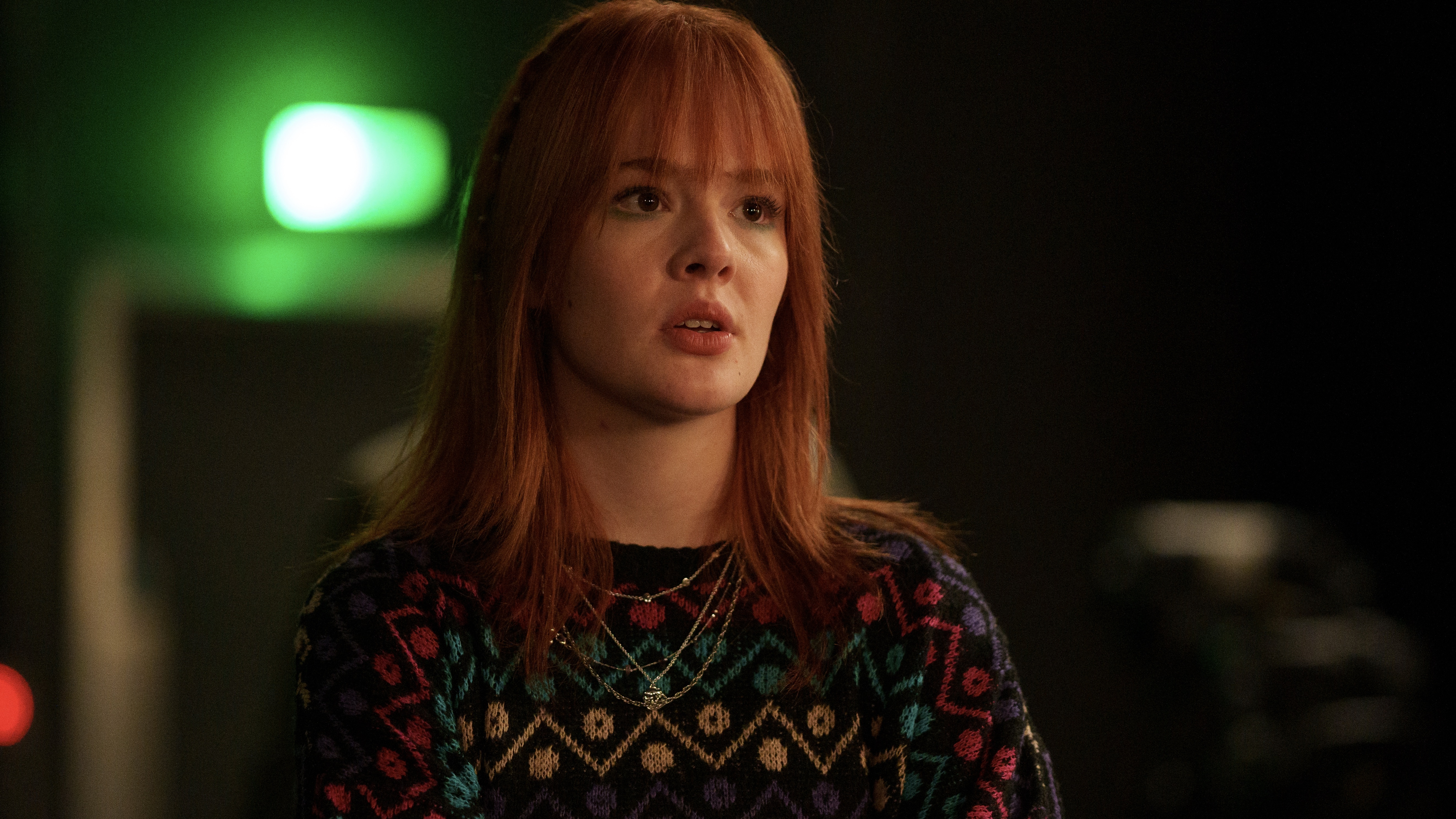 Madeleine Power in a patterned sweater as Claudia in Douglas is cancelled.