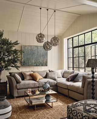 Farmhouse living room with a relaxed grey oka corner sofa
