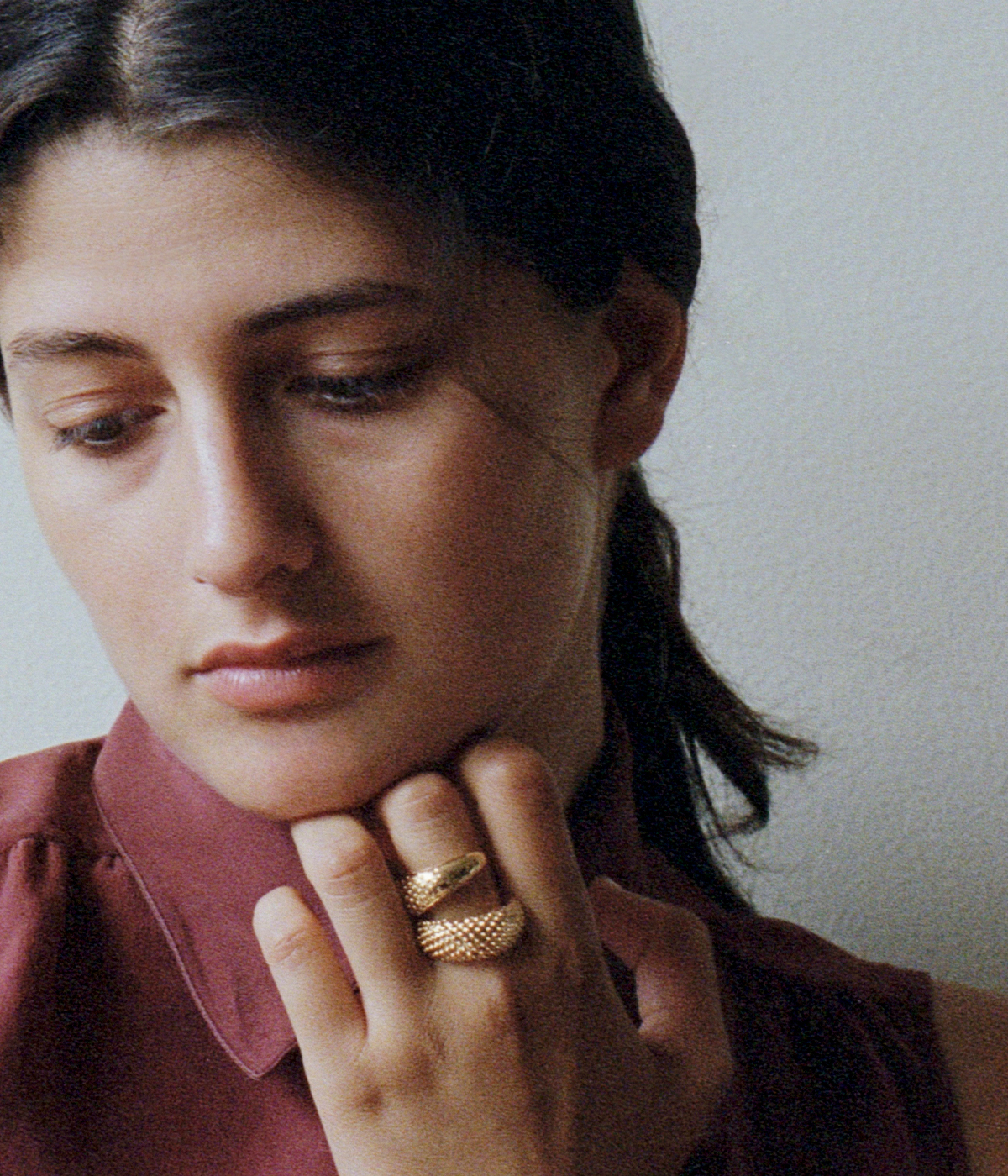 woman wearing gold jewellery