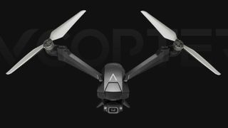 V-Copter Falcon Mini drone on a black background