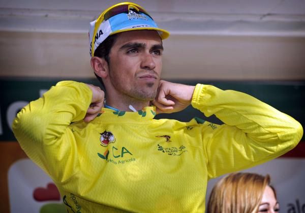 Contador pulls on his first yellow jersey of the season