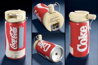 Coca-Cola's can for the STS-51F Carbonated Beverage Container Evaluation included an internal pressurized bladder and a teflon cap with a metal release valve and drinking spout.