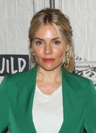 Sienna Miller with glowing skin and bright lips