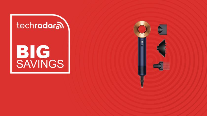 The Dyson Supersonic Hair Dryer on a red background with text saying Big Savings.