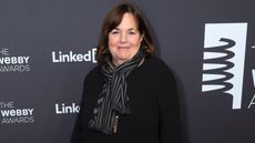 Ina Garten on red carpet with black backdrop