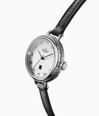 Birdy watch inspired by Georgia O’Keeffe, on black leather strap