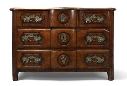 Provincial Louis XV fruitwood commode. Estimated at £1,000–£2,000