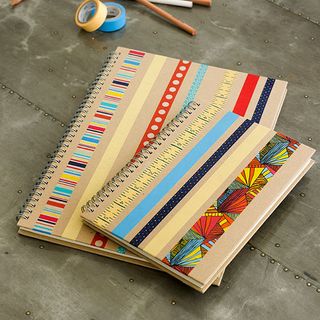 notebooks with tape and pens