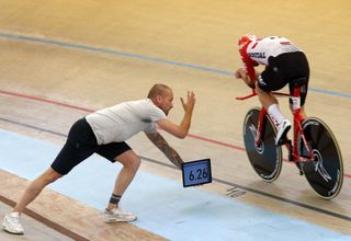 Lotto Soudal's Victor Campenaerts is kept abreast of his progress during his successful attempt at breaking the Hour Record