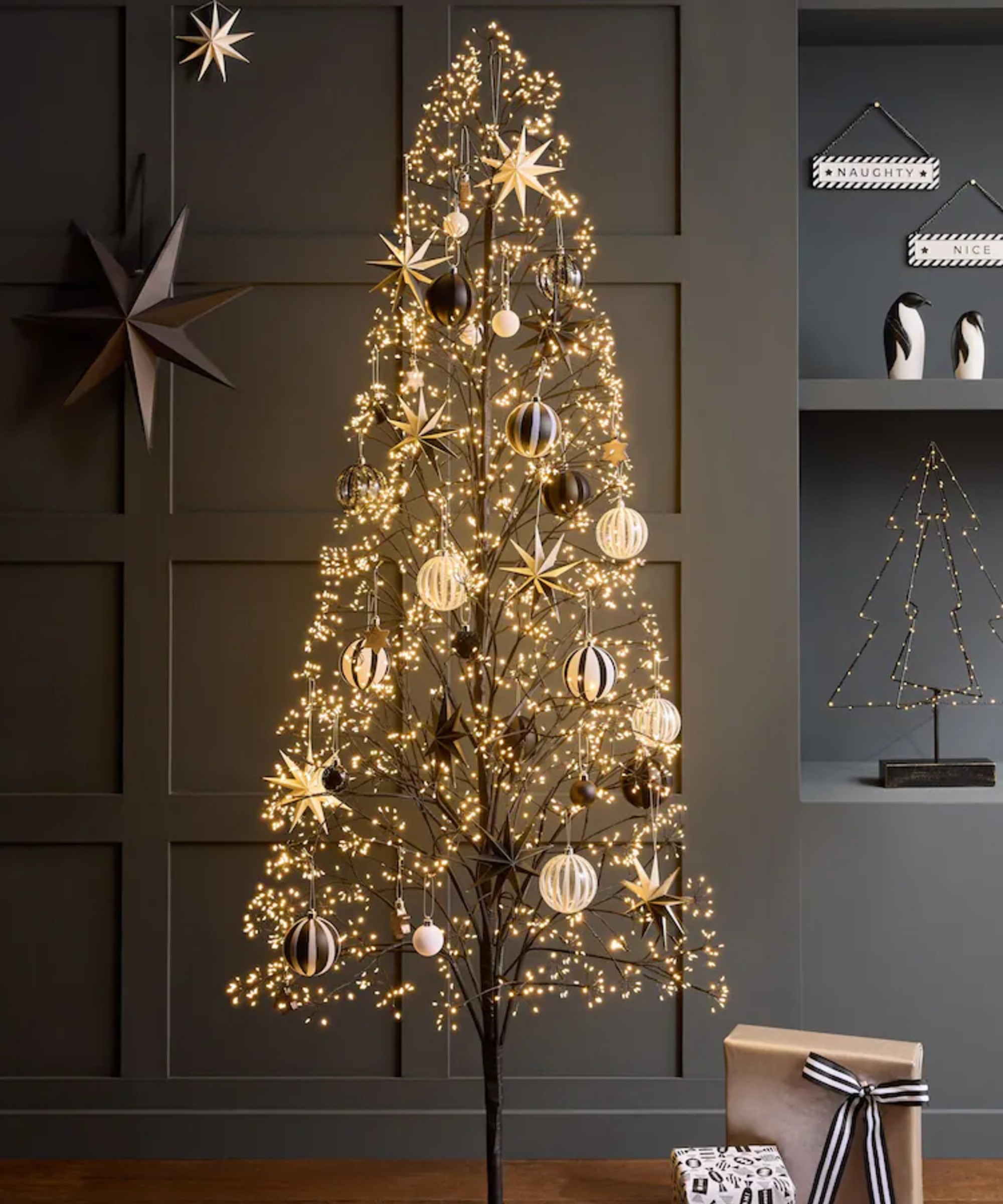 Next Black Twig Light 6ft Pre Lit Christmas Tree with black and white decorations