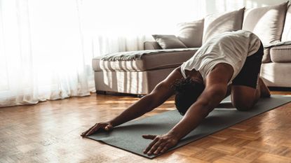 Man doing a pilates workout for his back